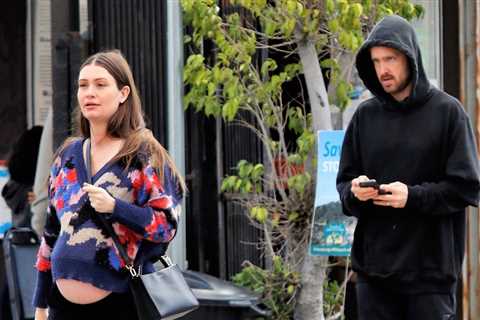 Aaron Paul’s pregnant wife Lauren Parsekian shows off her bare baby bump during the breakfast outing