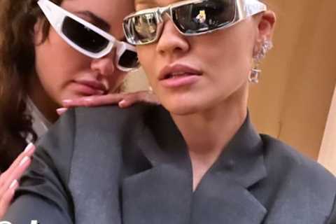 Rita Ora poses with rarely seen sister Elena backstage at Prada fashion week show