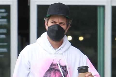 Joshua Jackson wears a hoodie with the face of Peter Dinklage while running errands