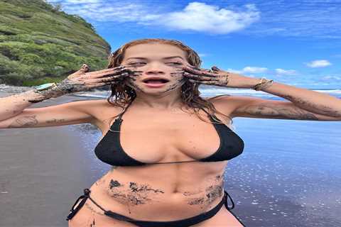 Rita Ora looks incredible in black bikini as she smears mud on her face