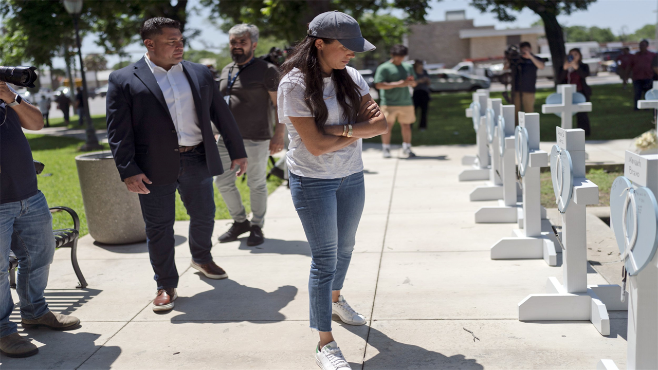 Meghan Markle lays flowers at Texas school shooting memorial in surprise appearance days after dad rushed to hospital