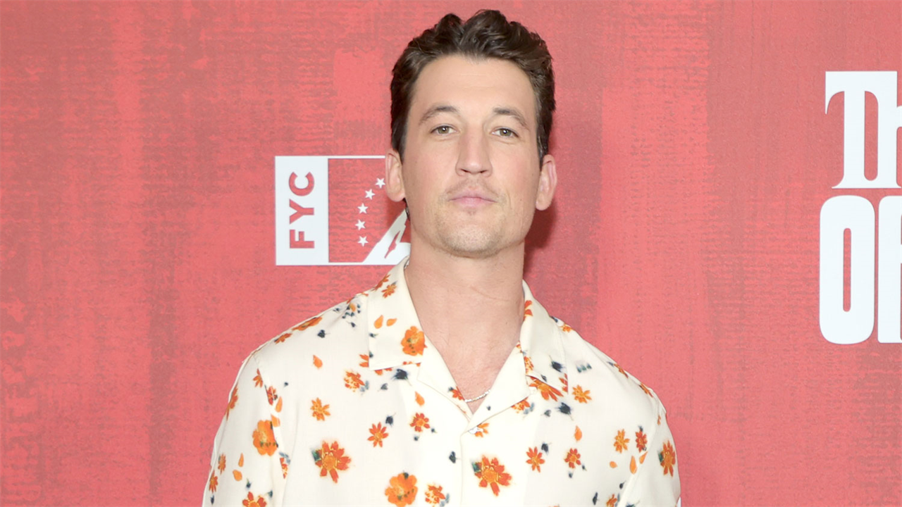 Miles Teller wears a floral print shirt to the FYC event The Offer.