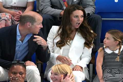 Princess Charlotte, 8, grins as she watches Commonwealth Games swimming race with mum Kate..