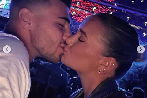 Molly-Mae Hague kisses Tommy Fury on romantic date night to see Coldplay at Wembley