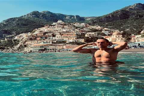 James Argent looks slimmer than ever as he poses topless while swimming in Italy