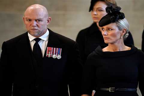 Mike Tindall spotted being told off for breaking silence during the Queen’s procession when Zara..