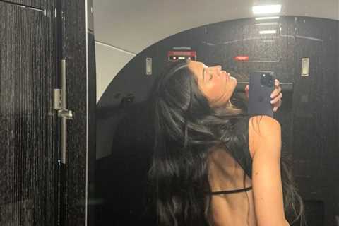 Kylie Jenner shows off thong underwear and flaunts her tiny waist in cut-out top for new photo