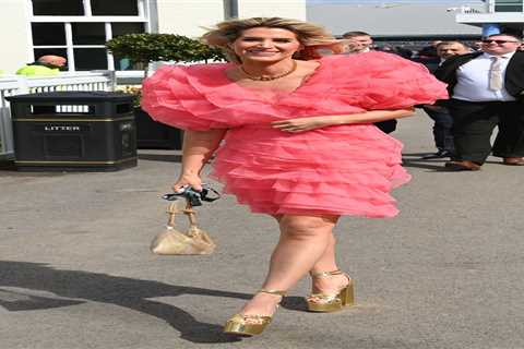 Sarah Jayne Dunn stuns as she goes braless in bright pink dress for day at the races