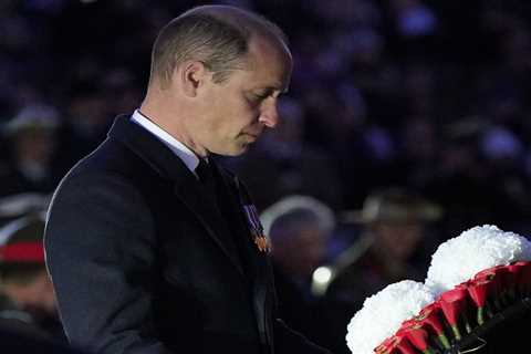 Prince William pays his respects to fallen Australian and New Zealand troops at Anzac Day dawn..