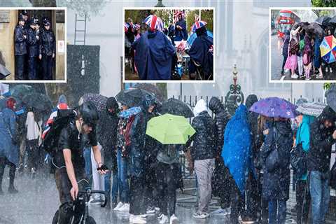 Royal fans get a SOAKING as torrential downpour hits hardy souls camping out on Mall ahead of..