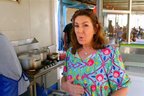 Jane McDonald sends fans wild as she spontaneously bursts into song while riding a bike in Cape..