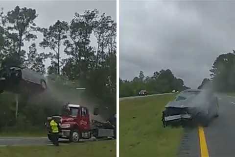 Car Flies Through Air After Hitting Tow Truck Ramp During Accident Cleanup
