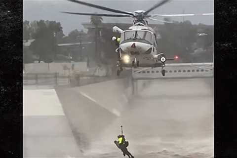 LAFD Uses Helicopter to Rescue Man and His Dog from L.A. River During Storm