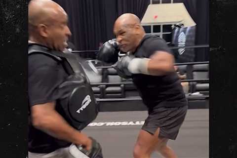 Mike Tyson Pummels Trainer, Looks Violent In New Workout Video