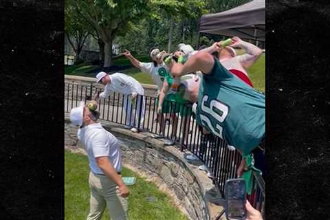 Jason Kelce Shotguns Beers With Fans At Charity Golf Tournament