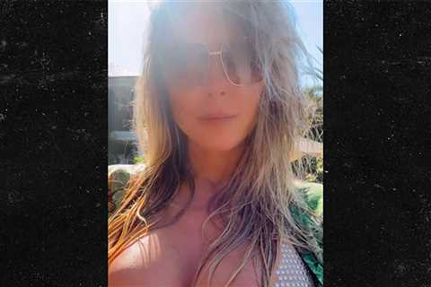 Heidi Klum Soaks Up the Sun in Itty-Bitty Bejeweled Bikini