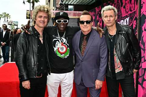 Watch Flavor Flav Hilariously Photobomb Green Day’s Hollywood Walk of Fame Ceremony