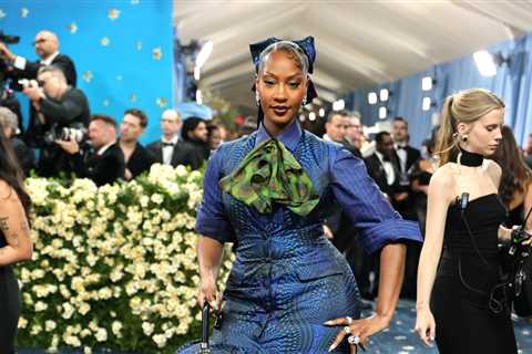 Tems Steps Out in Colorful Ankara Gown & Matching Umbrella at 2025 Met Gala