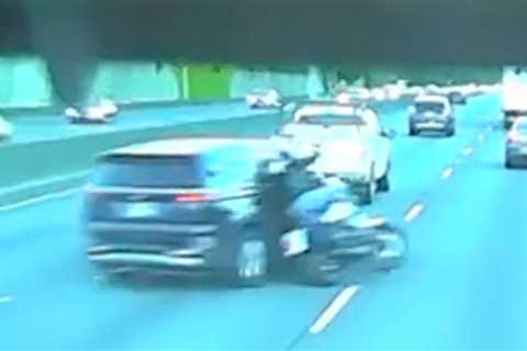 Minivan Swerves Into Motorcyclist, Mowing Down Rider in Road Rage, on Video