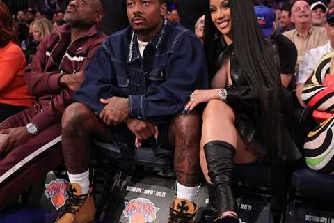 New Fashion Bomb Couple Cardi B and Stefon Diggs Sit Courtside with Cardi in a Leather Miu Miu..