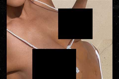 Guess Which Sexy Star Shared This Pearl Bikini Selfie?!