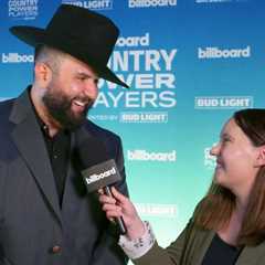 Carín León Talks Performing “No Es Por Acá,” Working with Cody Johnson on “She Hurts Like Tequila”..