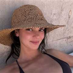 Kendall Jenner Tans in Tiny Black Bikini on Desert Trip