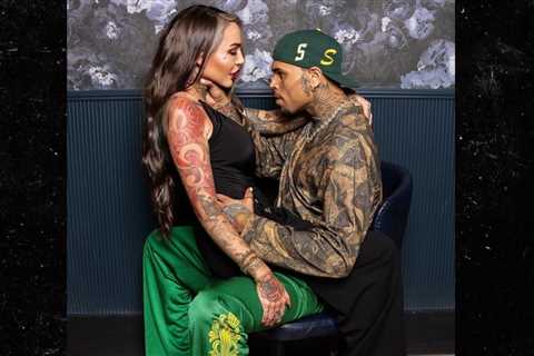 Chris Brown Puts Hands Around Woman's Neck at Meet and Greet
