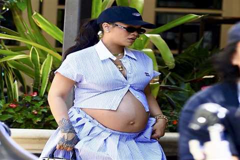 Rihanna Pairs  a Miu Miu Striped Look with a Louis Vuitton x Stephen Sprouse Bag and Louboutin..
