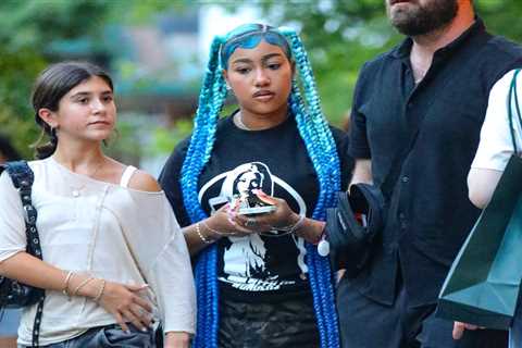 12-Year-Old North West (In Blue Braids) and 13-Year-Old Penelope Disick (in Balenciaga) Spotted in..