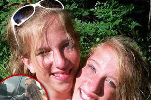 Conjoined Twins Abby and Brittany Hensel Strolling With Newborn Baby