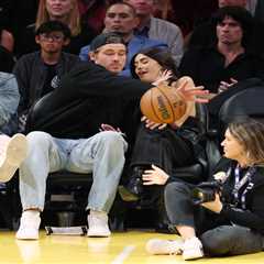 NFL star Justin Herbert saves pop star girlfriend Madison Beer from flying basketball at Lakers game