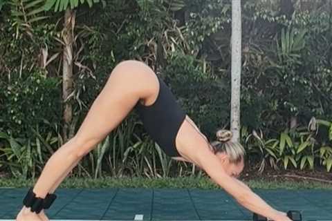 Candice Swanepoel Hits Downward Dog in Thong Leotard