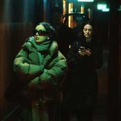 Watch Charli XCX Tumble Down Rabbit Hole of Fame in Electric First Trailer For ‘The Moment’