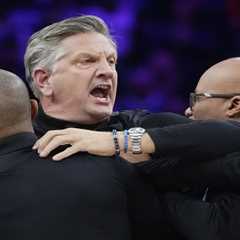 Timberwolves coach Chris Finch has to be restrained by staff as he’s ejected from game in wild scene