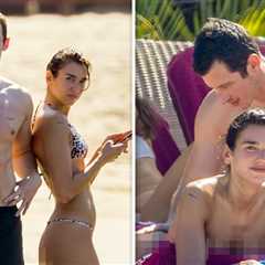 Dua Lipa Hits the Beach in Tiny Bikini, Shows PDA with Fiancé Callum Turner