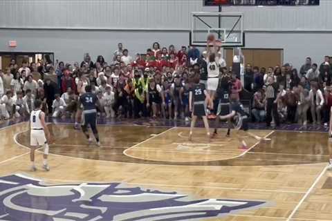 Taylor University basketball fans storm court as part of iconic ‘Silent Night’ tradition during..