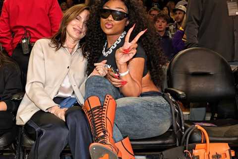 Megan Thee Stallion Courtside in Orange Lace-Up Heels and a Black-and-Feu Hermès Casaque HAC Bag at ..