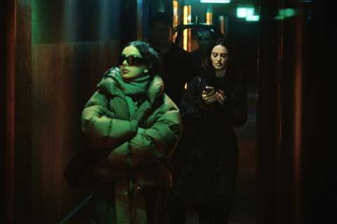 Watch Charli XCX Tumble Down Rabbit Hole of Fame in Electric First Trailer For ‘The Moment’