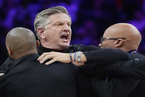 Timberwolves coach Chris Finch has to be restrained by staff as he’s ejected from game in wild scene