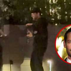 Tobey Maguire Scales Wall With Beer in Hand While Out With Mystery Girl, on Video