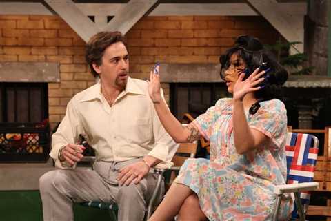 Cardi B Brings the Laughs as Feisty Wife in ‘Immigrant Dad Talk Show’ Sketch on ‘SNL’: Watch
