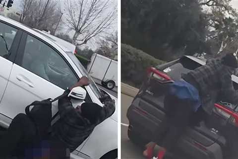 Man Hitches Death-Defying Rides Hanging Onto Cars in Traffic, on Video
