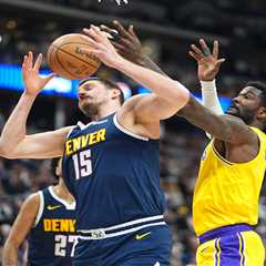 Lakers’ Deandre Ayton leaves game against Nuggets with knee injury