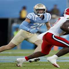 UCLA football coach Bob Chesney’s players must constantly make grade