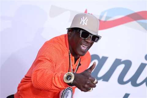 Watch ‘Champion of All Athletes’ Flavor Flav Throw the First Pitch at Fenway Park on Easter