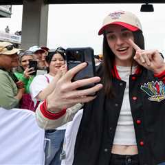 Caitlin Clark rocks custom helmet, get raucous ovation as Indy 500 Grand Marshal