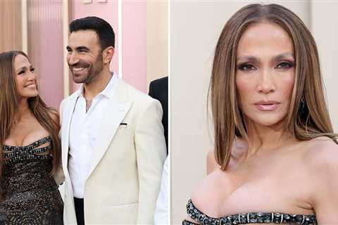 Jennifer Lopez And Brett Goldstein Get Cozy at 'Office Romance' Premiere