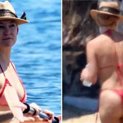 Kate Hudson Paddle Boards in a Thong Bikini