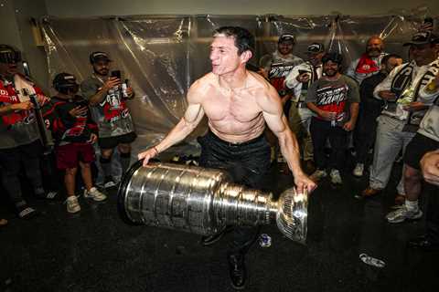 Hurricanes coach Rod Brind’Amour goes shirtless to lift Stanley Cup in wild locker room celebration